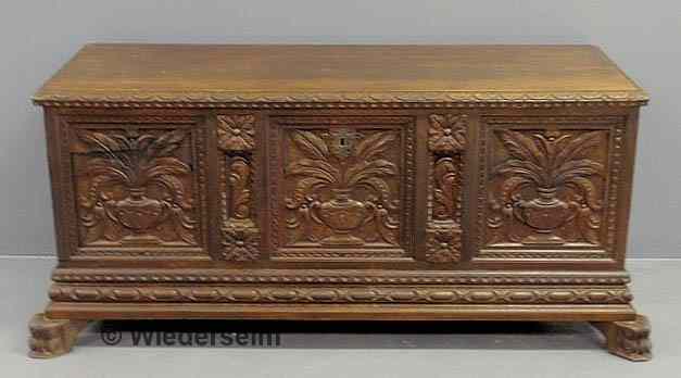 Appraisal: Italian carved walnut cassone th c with three floral decorated