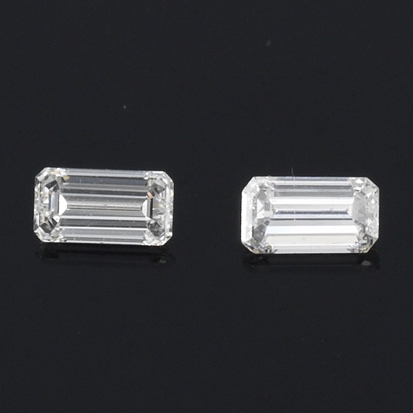 Appraisal: UNMOUNTED PAIR OF EMERALD CUT DIAMONDS Total weight carat