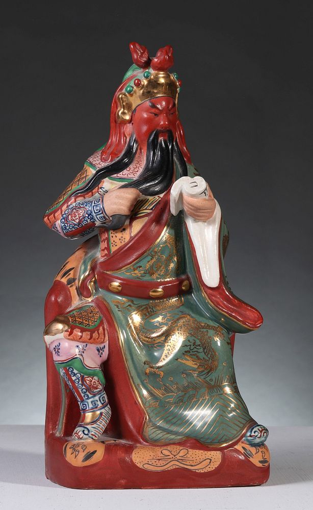 Appraisal: A MID TH CENTURY CHINESE PORCELAIN FIGURE OF GUANDI The