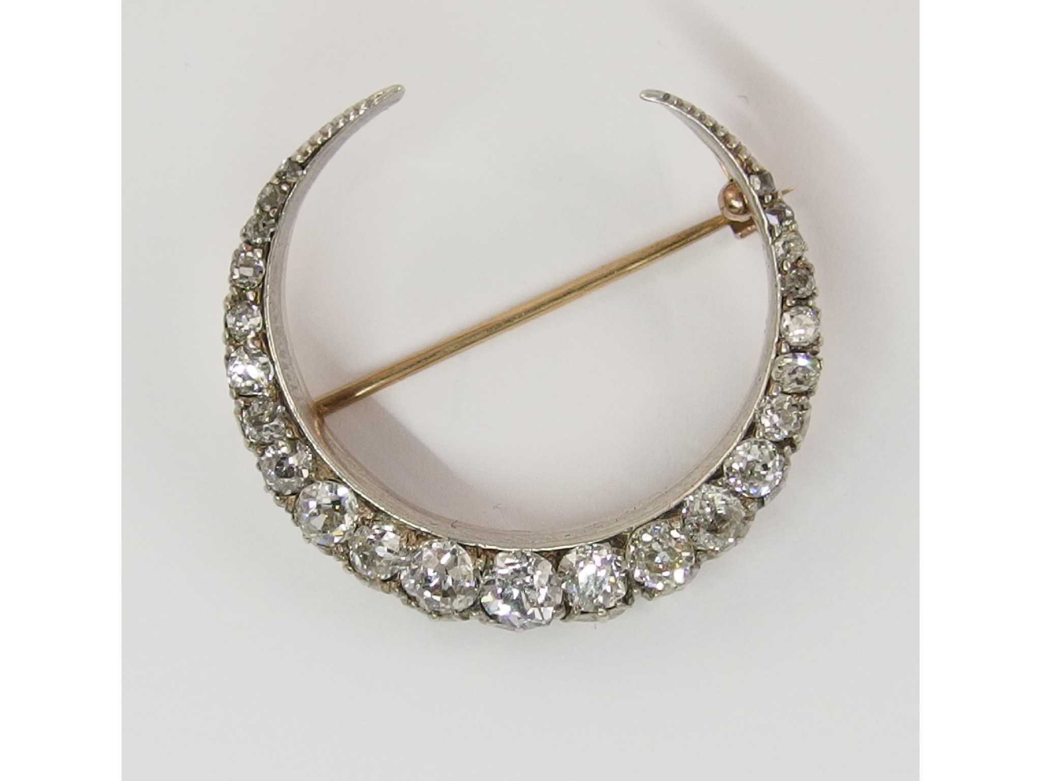 Appraisal: A Victorian diamond crescent moon broochset with approximately cts of