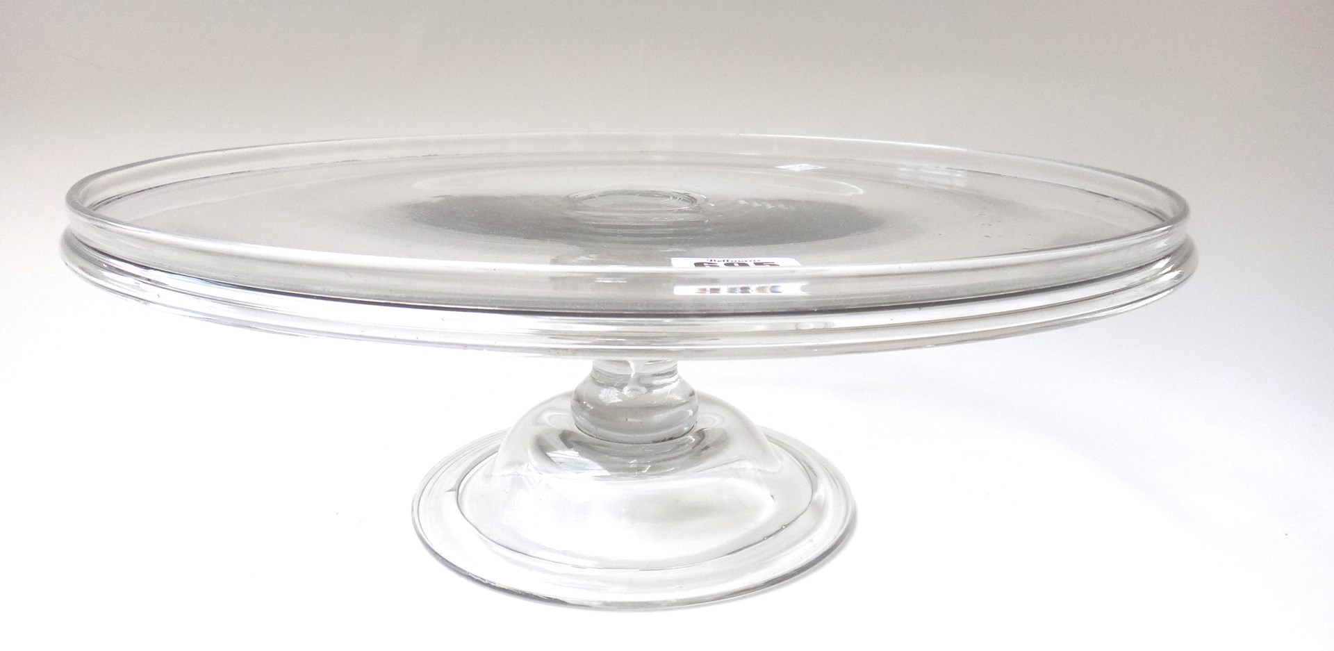 Appraisal: A large English glass tazza th century with galleried rim