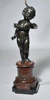 Appraisal: French Bronze Sculpture Large French bronze sculpture of a cherub