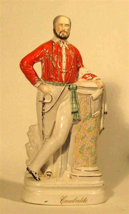 Appraisal: Staffordshire figure of Garibaldi leaning on a pedestal H in