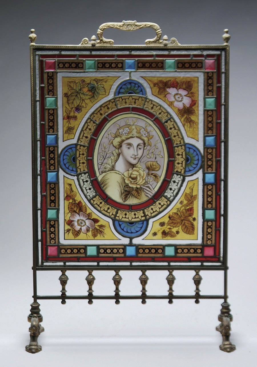 Appraisal: FINE LEADED AND STAINED GLASS FIRE SCREEN The ornate brass