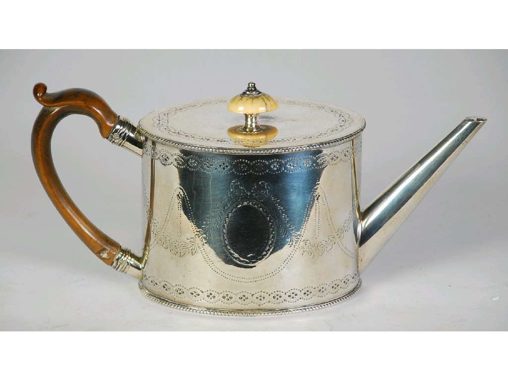 Appraisal: GEORGE III SILVER OVAL CYLINDRICAL TEAPOT with straight tapered spout