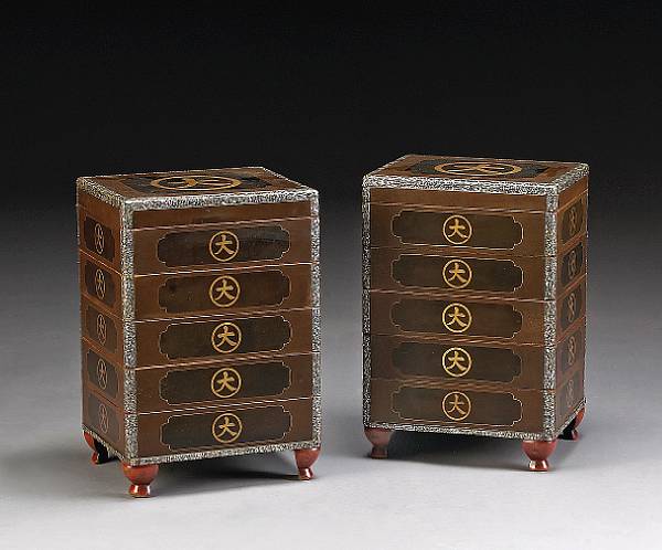 Appraisal: A pair of layered lacquered wood boxes Supported on four