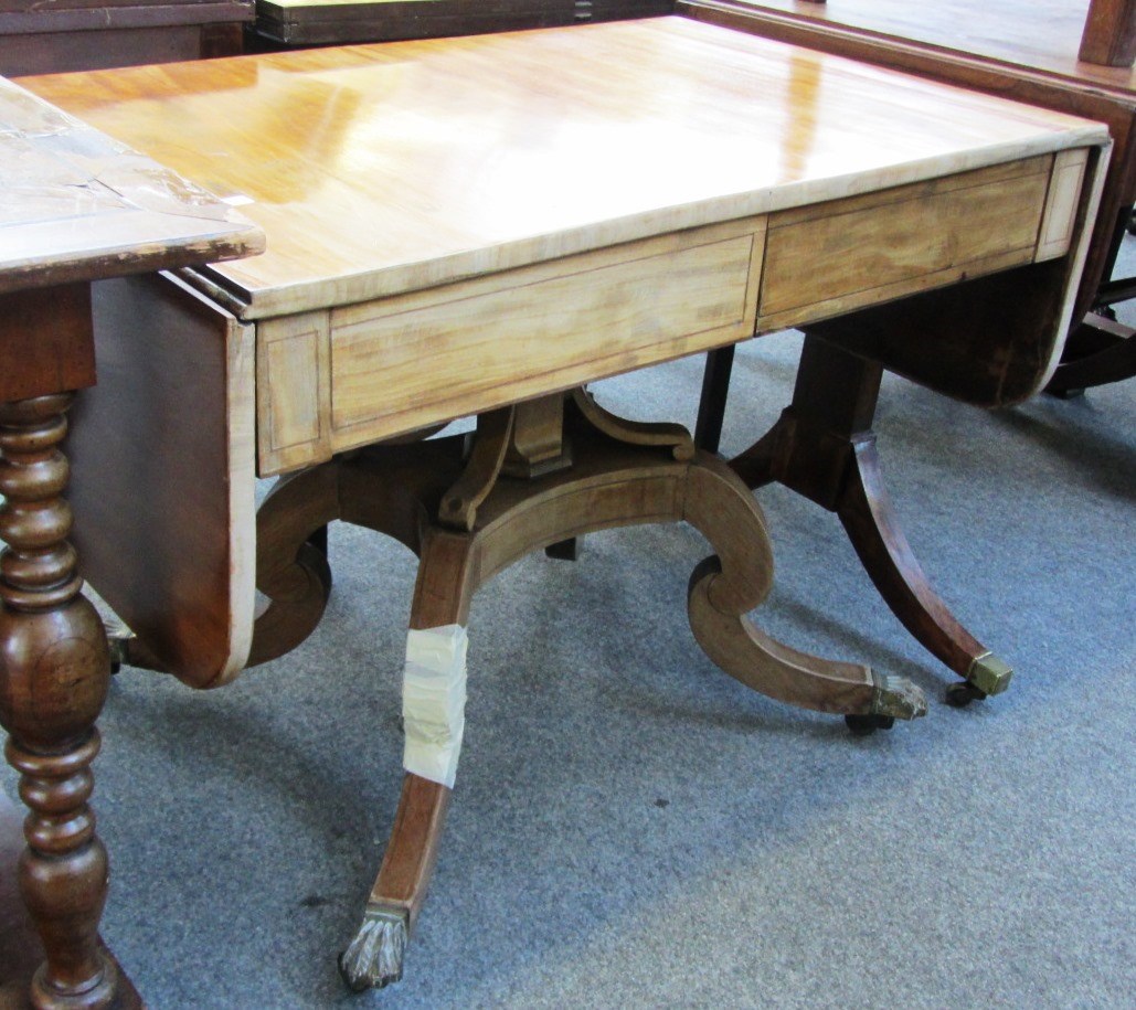 Appraisal: An early th century mahogany library table with a pair