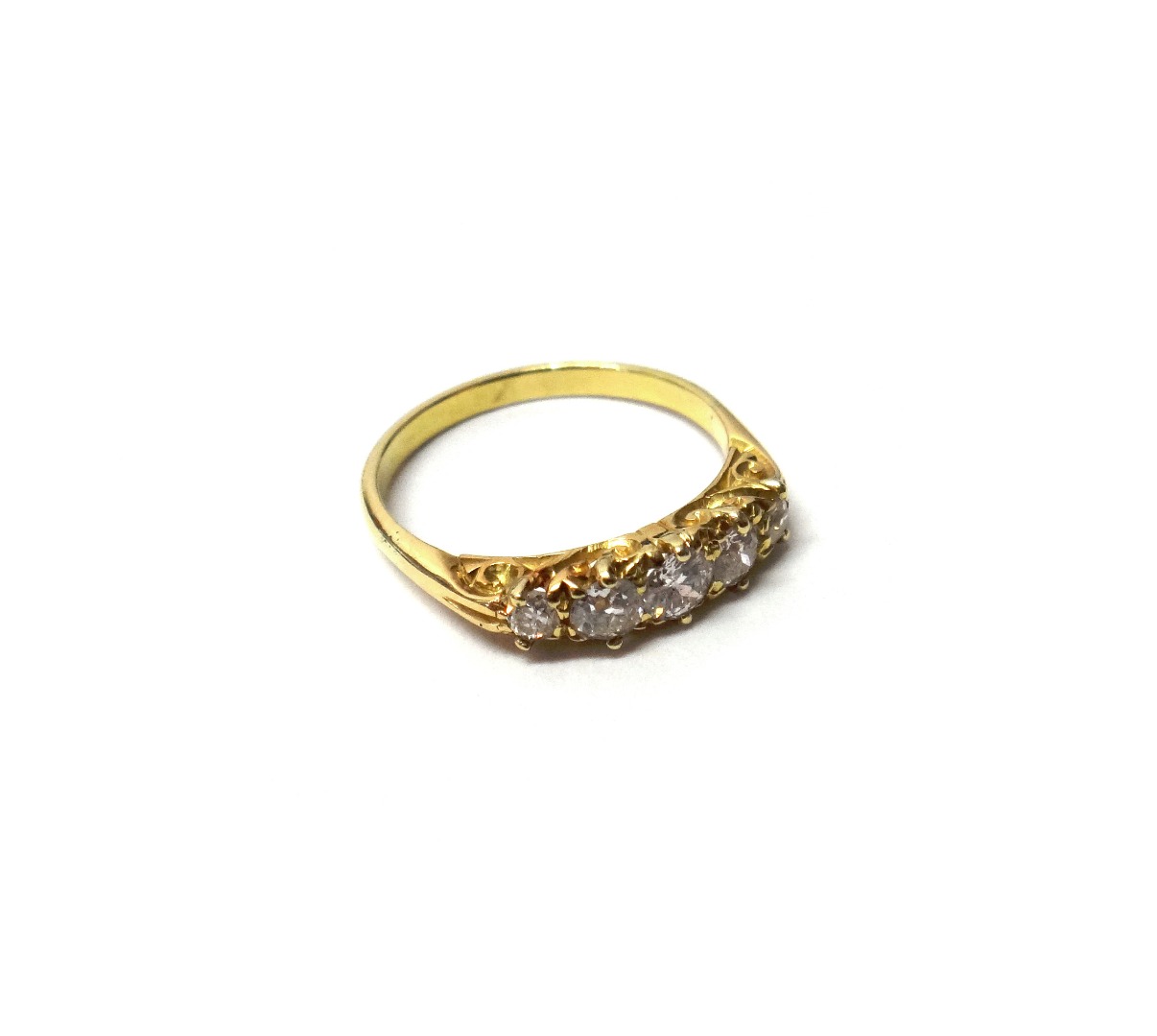 Appraisal: A gold and diamond set five stone ring claw set