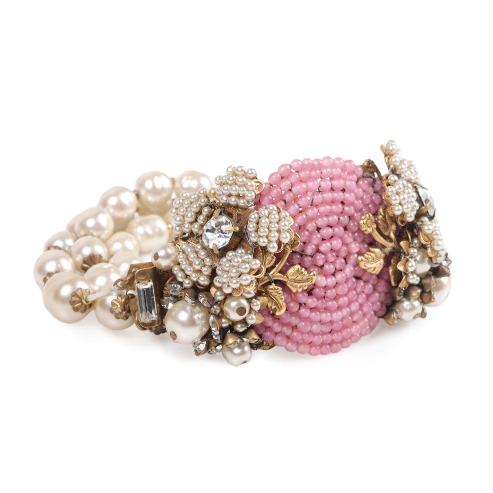 Appraisal: MIRIAM HASKELL TRIPLE STRAND FAUX PEARL BRACELET WITH FLORAL MEDALLION