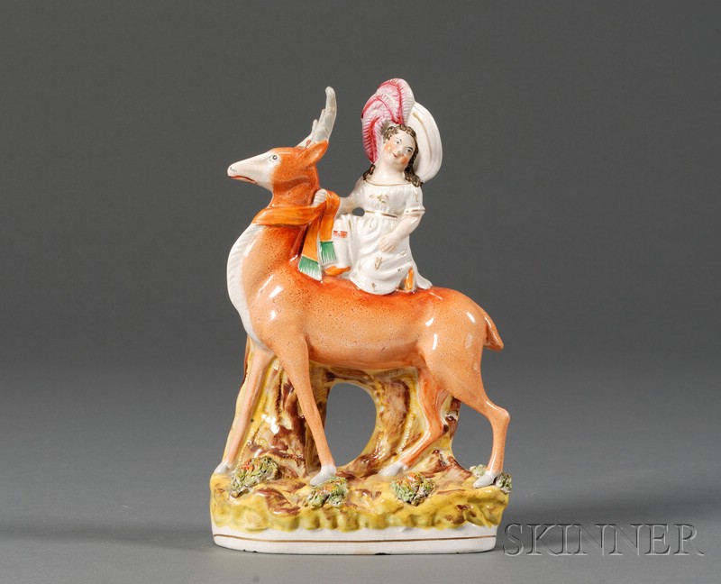 Appraisal: Staffordshire Figure of a Girl Riding a Stag England c