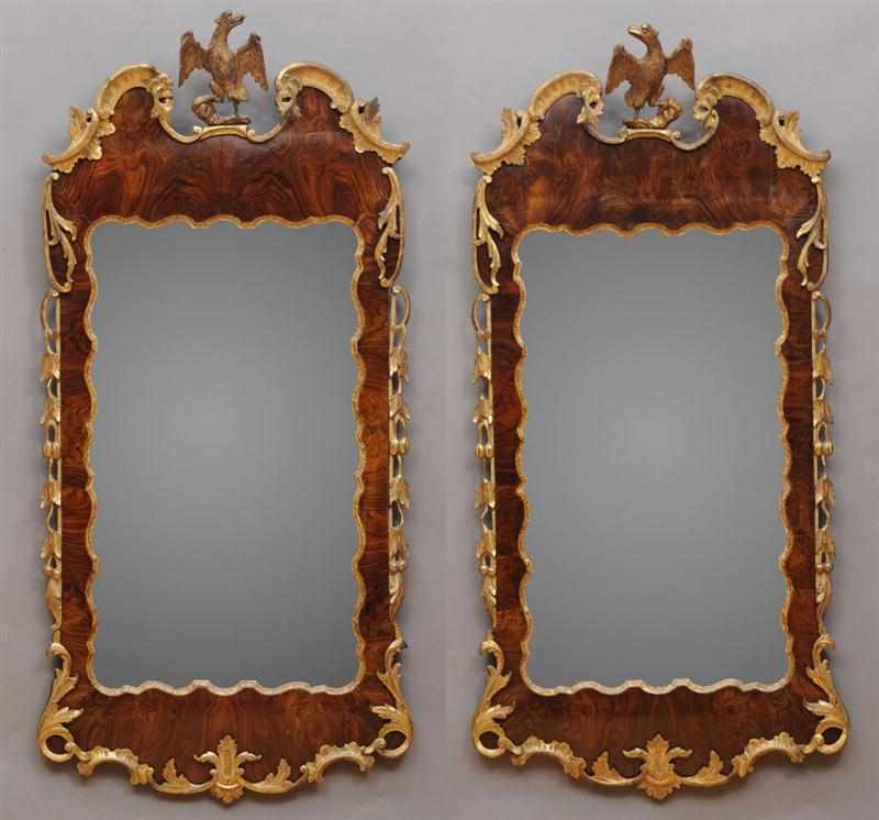 Appraisal: PAIR OF GEORGE II WALNUT CARVED AND PARCEL GILT MIRRORS