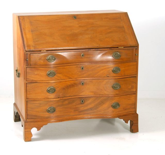 Appraisal: ANTIQUE AMERICAN SLANT-LID DESK Circa In mahogany with serpentine front