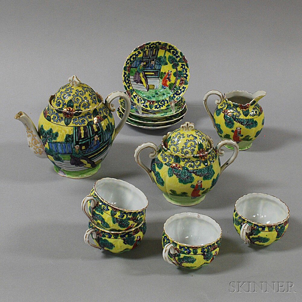 Appraisal: Eleven-piece Chinese Famille Jaune Tea Set for export four teacups