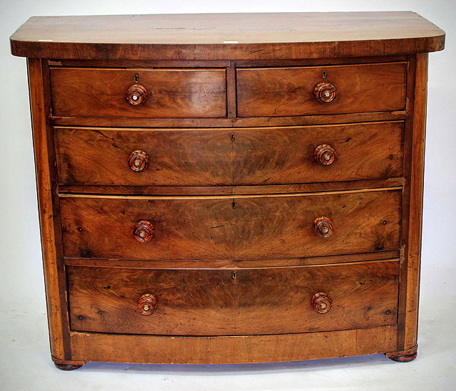 Appraisal: A LATE VICTORIAN MAHOGANY BOW FRONTED CHEST of two short