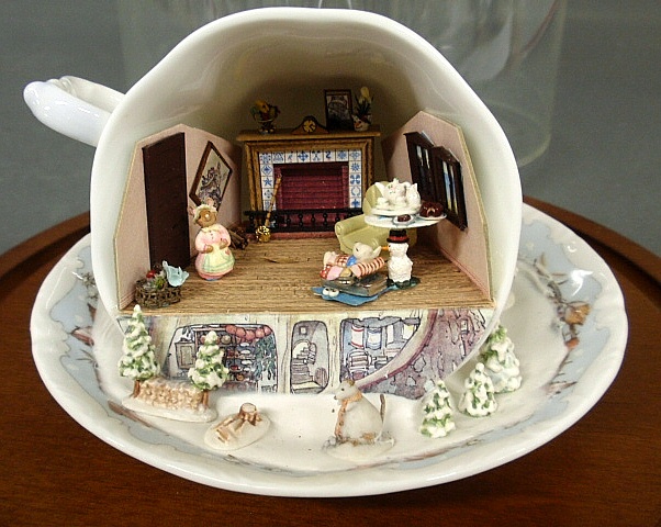 Appraisal: - Glass dome cased miniature scale Brambly Hedge teacup scene