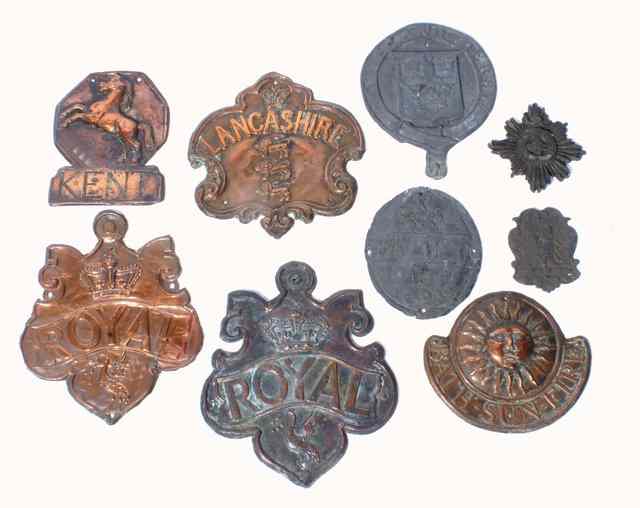 Appraisal: A GROUP OF FIVE EMBOSSEED COPPER FIRE MARKS consisting of