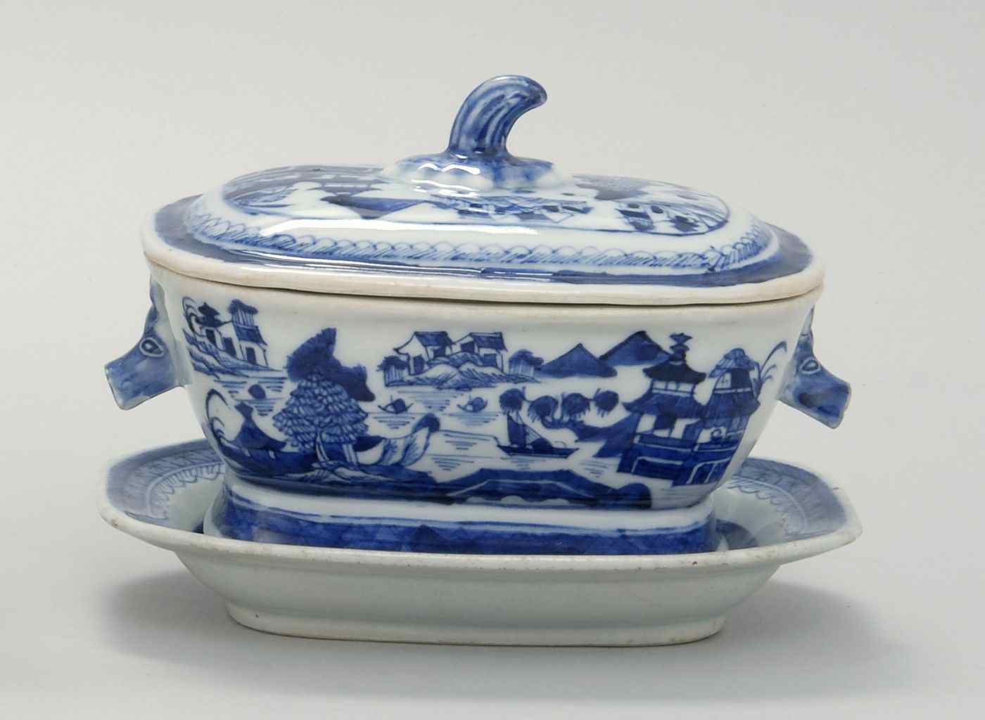 Appraisal: CHINESE EXPORT BLUE AND WHITE CANTON PORCELAIN COVERED SAUCE TUREENWith