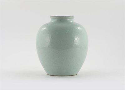 Appraisal: A Chinese white-glazed ovoid vase incised with an allover lotus