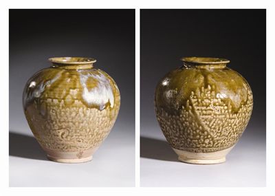 Appraisal: A rare pair of Chinese phosphatic and olive-green glazed ovoid