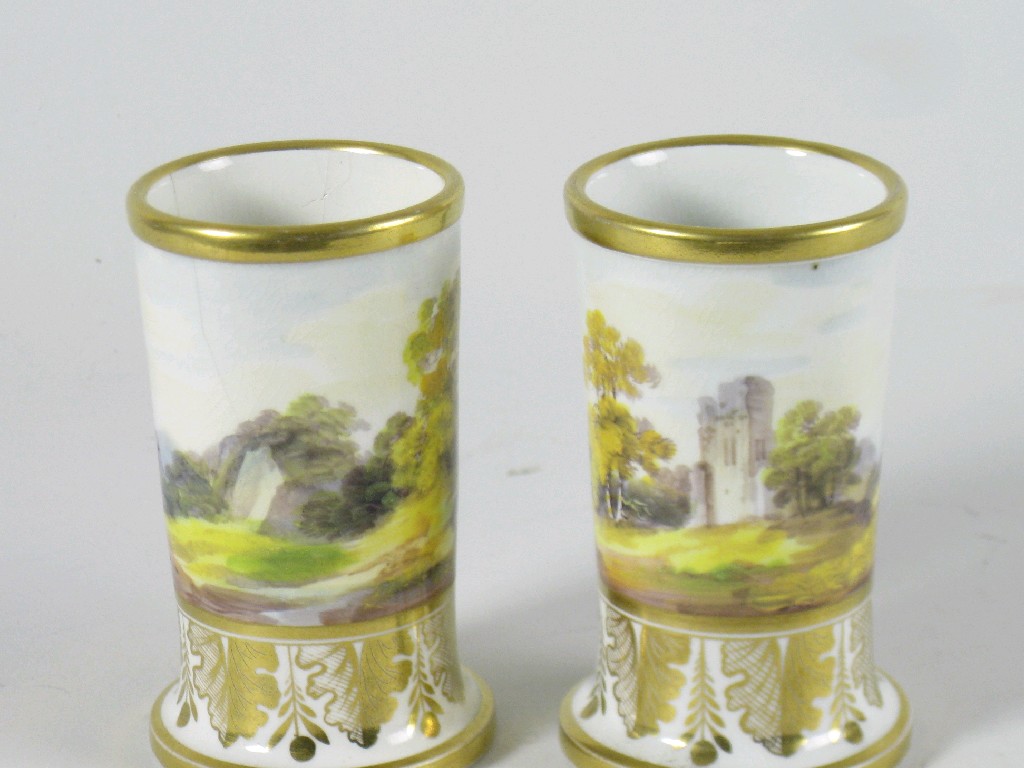 Appraisal: Pair of th Century Masons Spill Vases painted landscape friezes