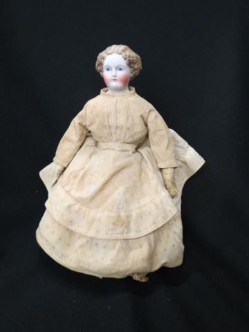 Appraisal: th Century Bisque Head Doll molded light brown hair rosey