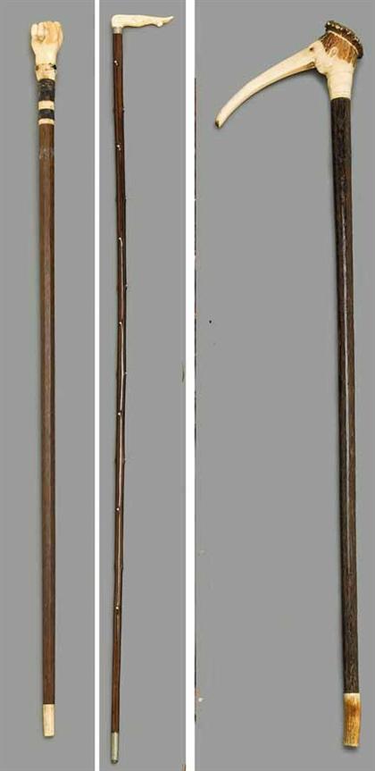 Appraisal: Group of three walking sticks with ivory or bone handles