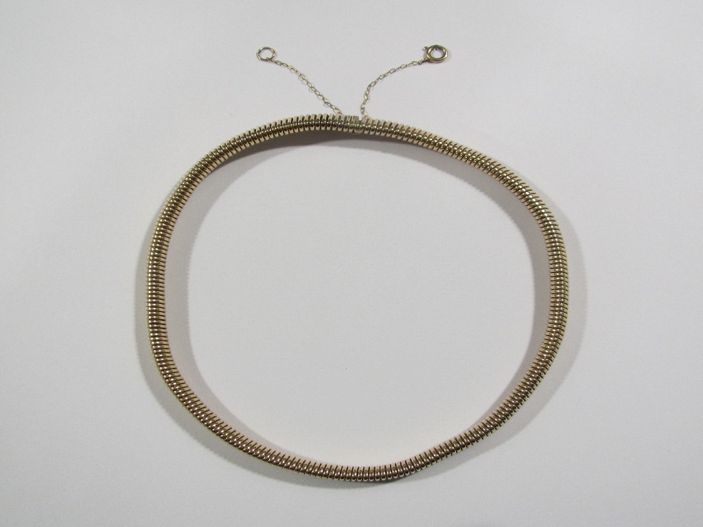 Appraisal: Nine carat gold ribbed tubular choker necklace Approximately gms