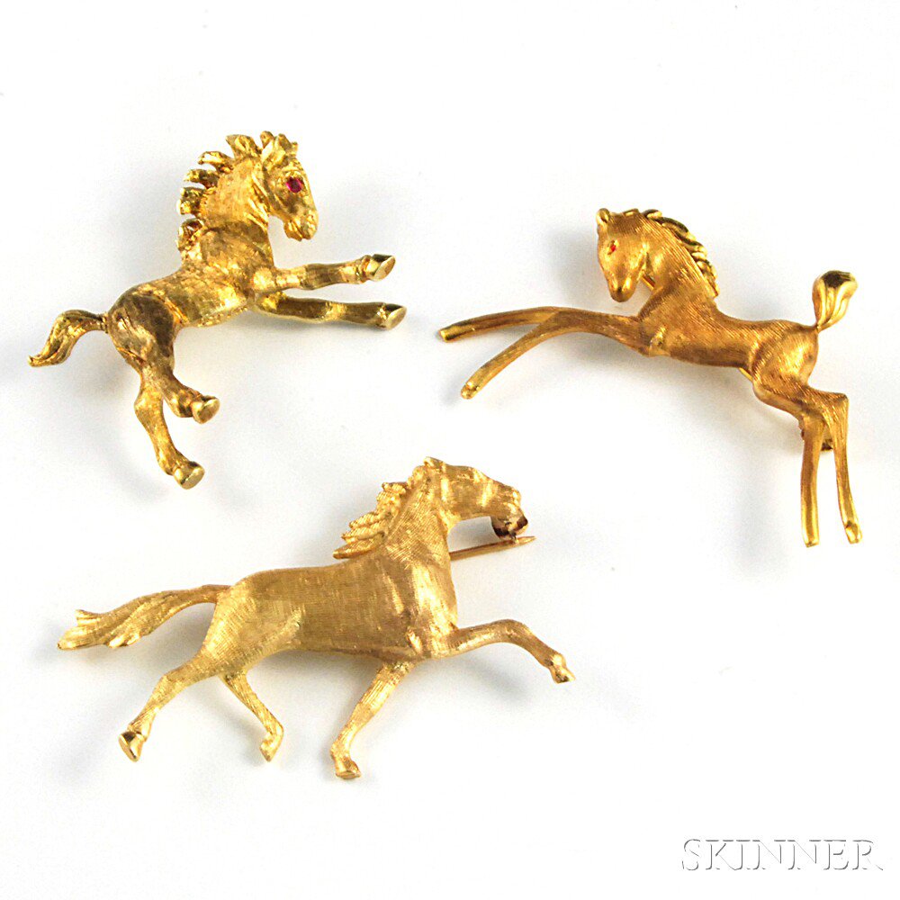 Appraisal: Three Gold Horse Brooches a brushed kt gold pin an