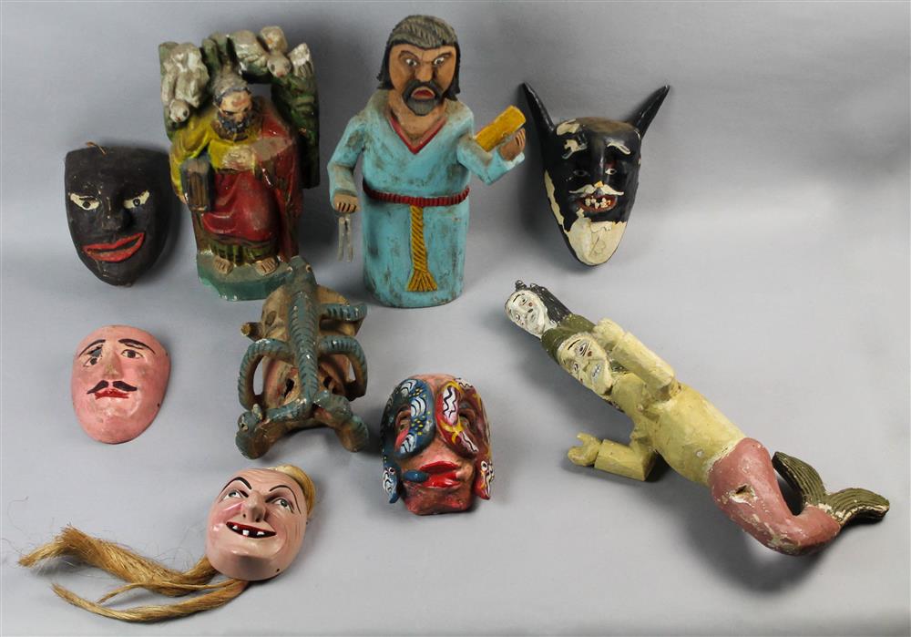 Appraisal: COLLECTION OF MEXICAN WOODEN FIGURES AND MASKS including a painted