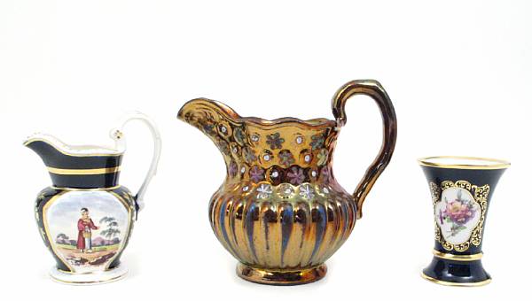 Appraisal: A group of decorative table articles including four lustre pitchers