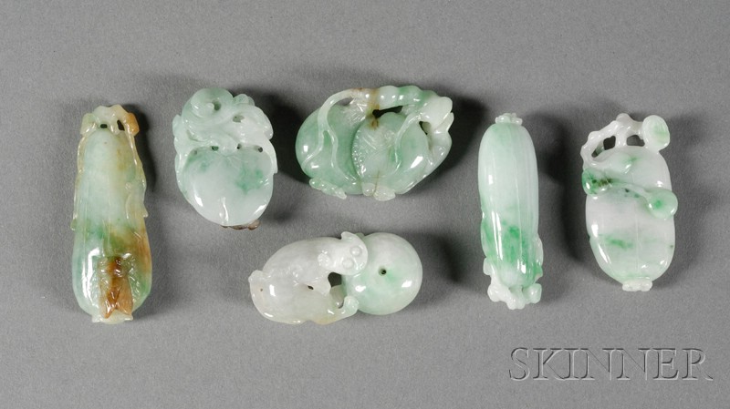 Appraisal: Five Jade Pendants green with bright green markings three carved