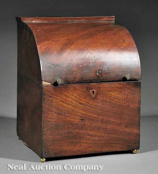 Appraisal: A George III Mahogany Tantalus early th c domical lid