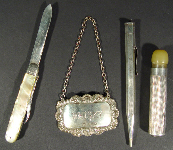 Appraisal: Four silver items comprising an unusual cylindrical torch a mother