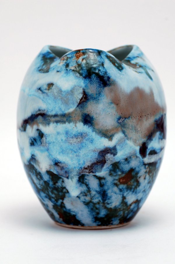 Appraisal: Handformed Japanese studio pottery vase with molded colors of cobalt