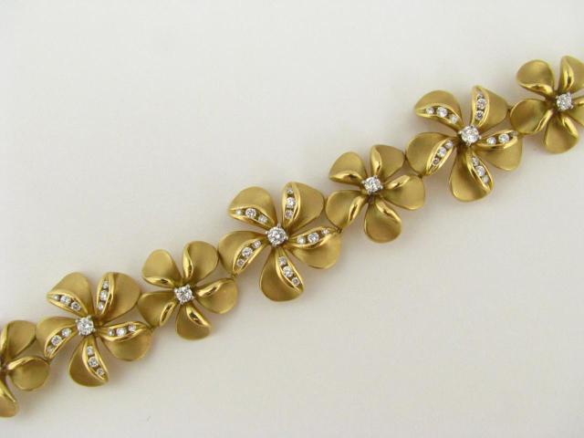 Appraisal: K Yellow Gold and Platinum Signed Na Hoku designer Plumeria