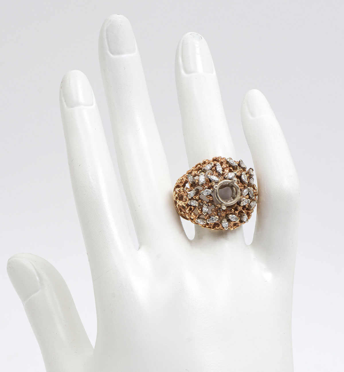 Appraisal: K DIAMOND DOME RING K yellow gold ring contains marquise