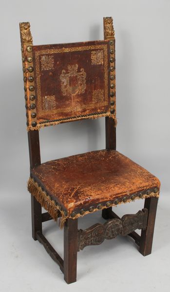 Appraisal: th Century Italian carved chair with tooled leather back h