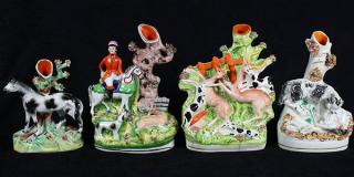 Appraisal: lot of Staffordshire figural spill vases h century comprising a