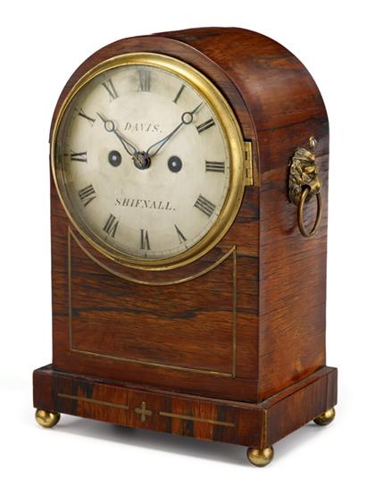 Appraisal: Regency rosewood and brass inlay mantle clock Of arched case