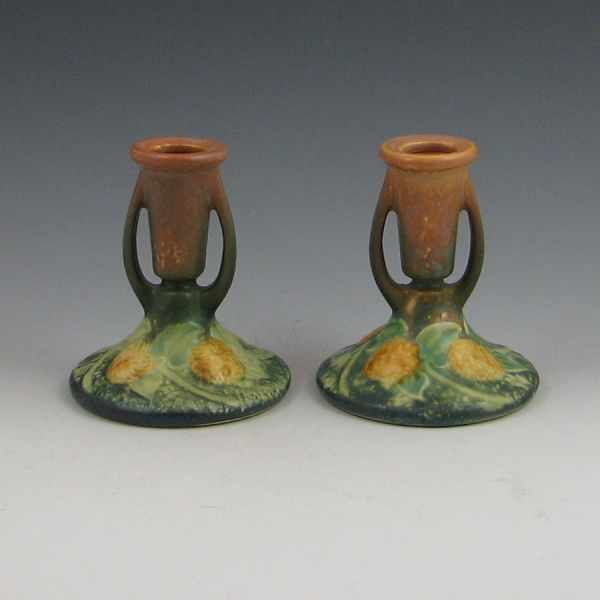 Appraisal: Pair of Roseville Sunflower - '' candleholders One is marked