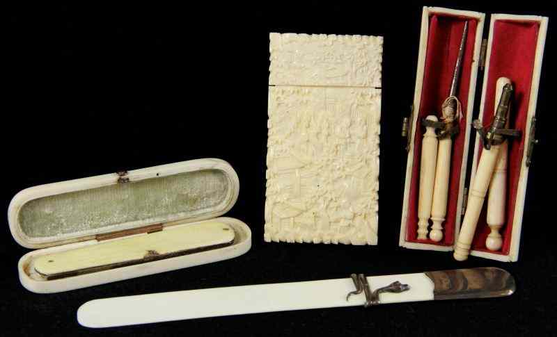 Appraisal: Four th century Ivory Articlesthe first a cased folding Victorian