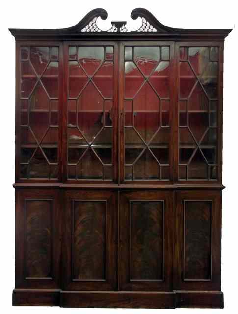 Appraisal: A mahogany breakfront bookcase of late th Century design with