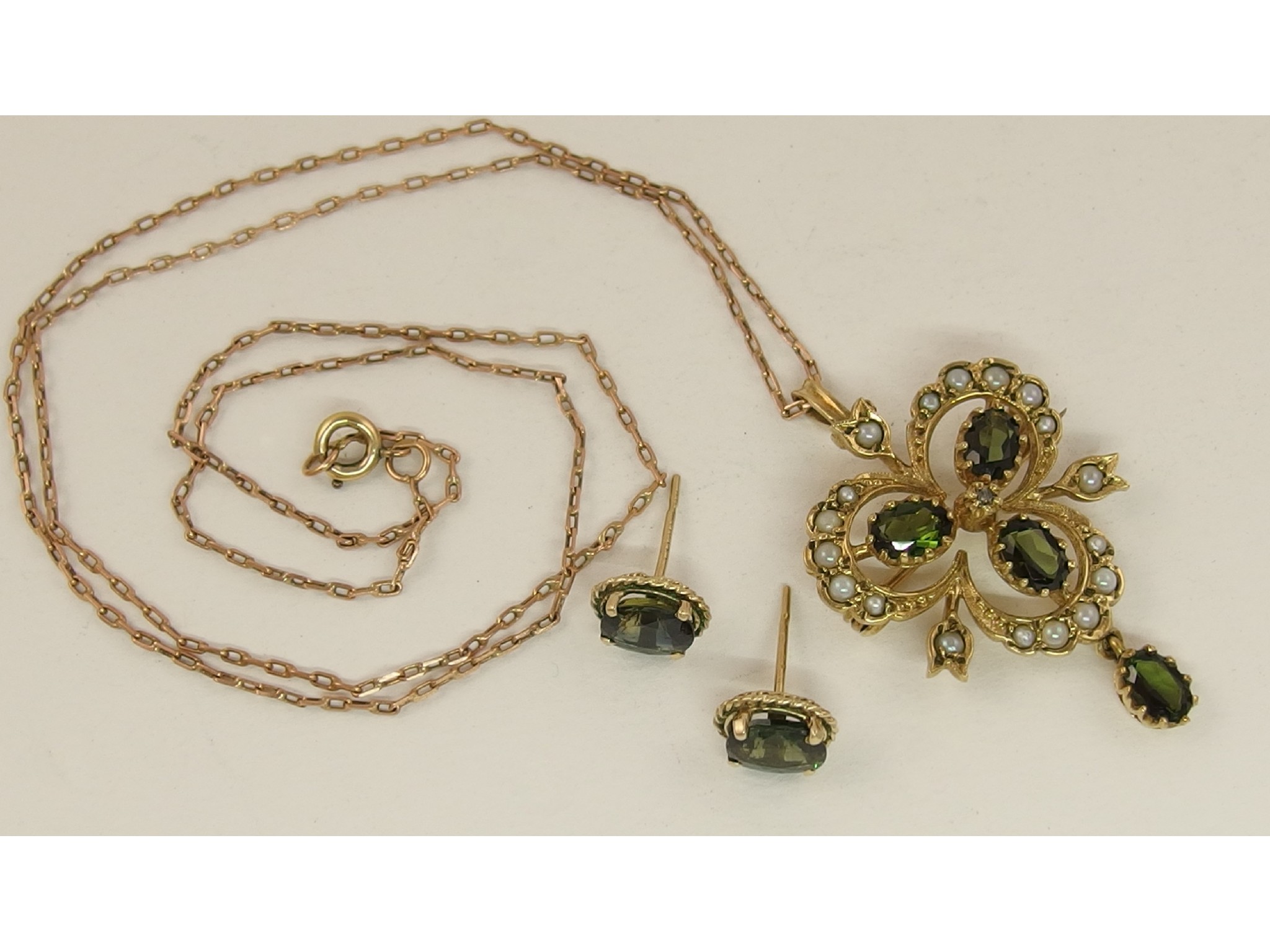 Appraisal: A ct mid green gem stone and pearl set pendant