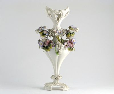 Appraisal: A Grainger Worcester biscuit porcelain vase applied with convolvulus pink