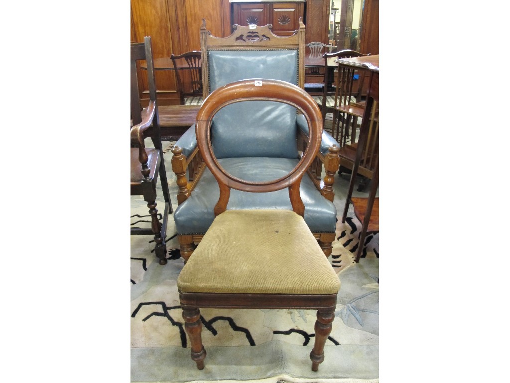 Appraisal: Victorian oak parlour armchair and a Victorian dining chair