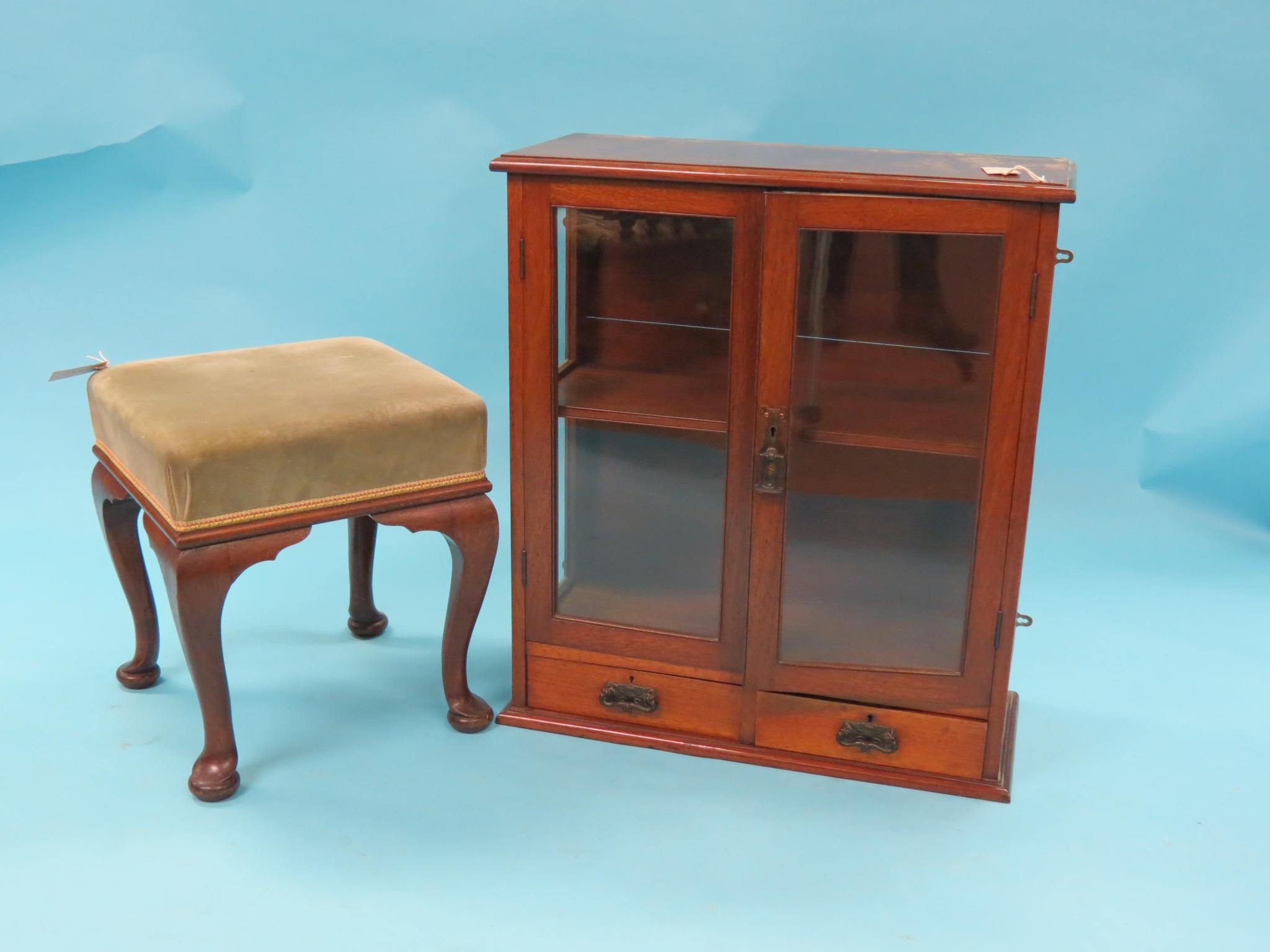 Appraisal: A Victorian wall-hanging mahogany display cabinet pair of glazed doors