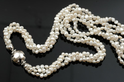 Appraisal: DOUBLE STRAND OF FRESH WATER PEARLS TO A SILVER CLASP