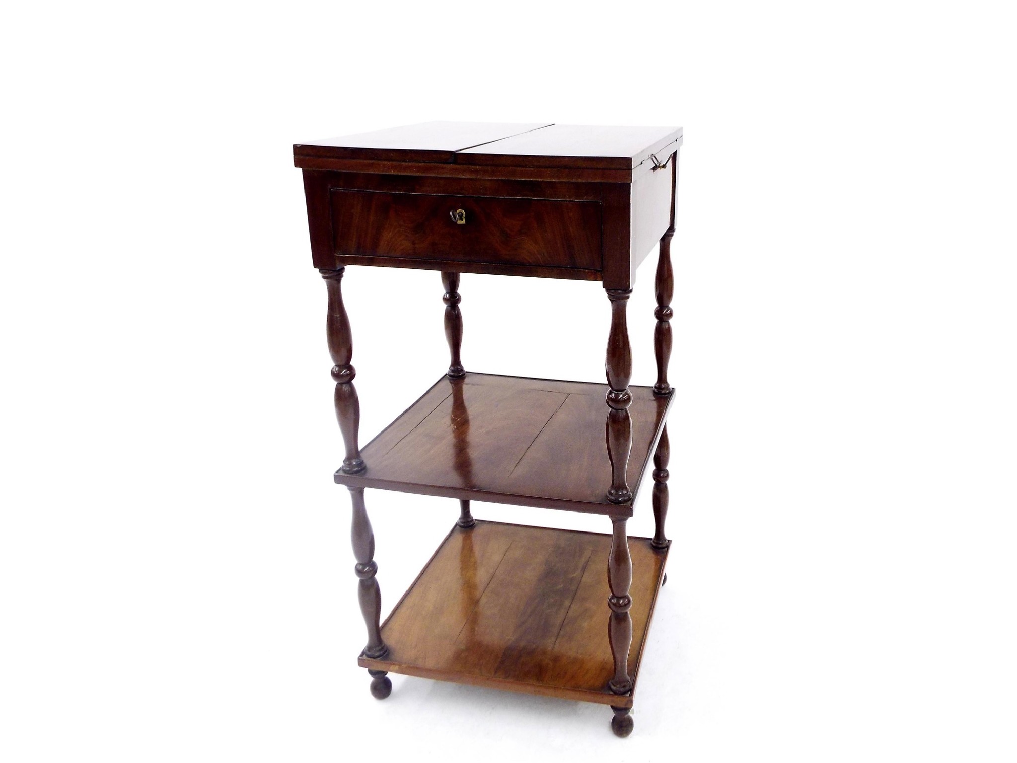 Appraisal: th century mahogany three tier whatnot with hinged top and