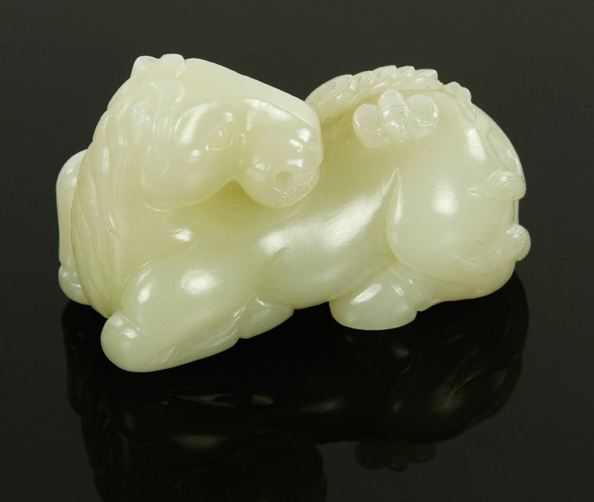 Appraisal: - Chinese Carved White Jade Horse Carved white jade figure