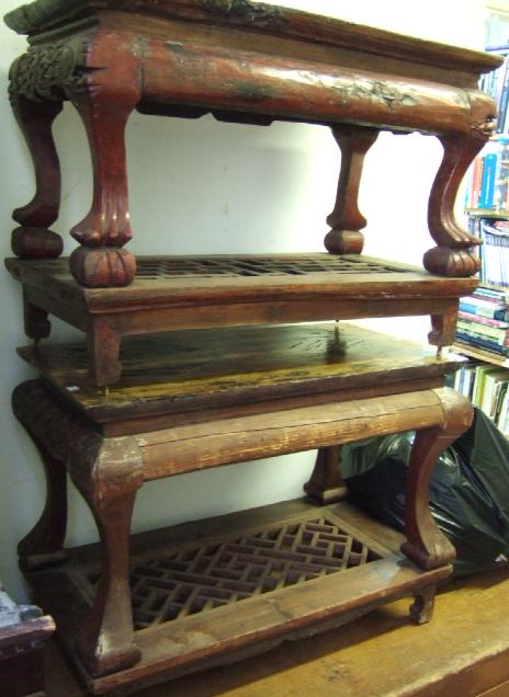 Appraisal: A matched pair of th century hardwood low side tables